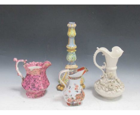A quantity of ceramics and glassware to include some silver topped glass bottles, a Majolica style triform candlestick with h