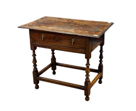 An 18th century oak side table, with single frieze drawer on turned legs,72 x 85 x 54cm