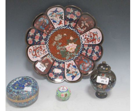 A Japanese cloisonne charger, a Chinese blue ground pot and cover, a Ginbari cloisonne jar and cover and a small Canton ename