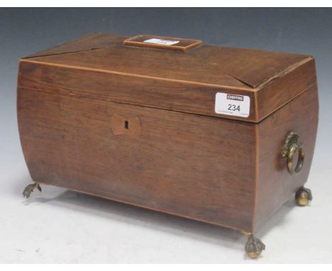 A rosewood tea caddy, 19th century, of sarcophagus form on gilt metal claw and ball feet, 20 x 32 x 17cm
