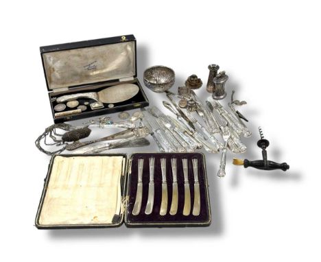 An Indian metalwares serving trowel stamped Sterling silver, an Indian metalwares bowl, some silver handled cutlery and flatw