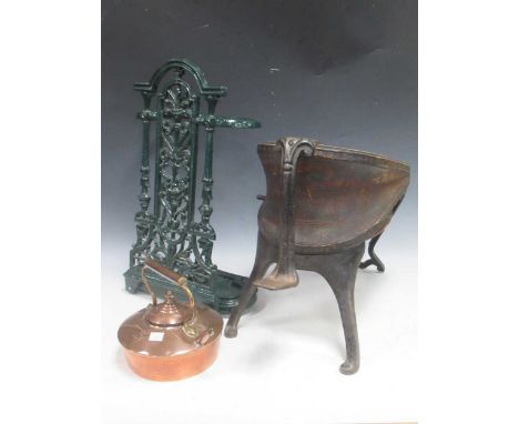 A pair of 19th century foot-bellows; together with a green-painted cast-iron stick stand and a copper kettle (3)