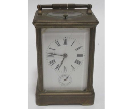 A French brass repeating carriage clock, with gong striking movement, 14cm high