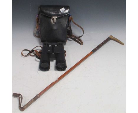 A cased pair of Leica binoculars; together with a riding crop