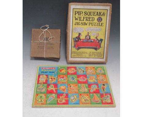 An early 20th century boxed English jigsaw puzzle of Little Boy Blue by Holtzapffel &amp; Co., 75 pieces; together with anoth