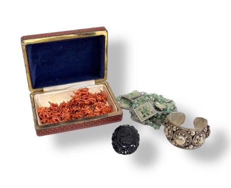 An imitation jade necklace, together with four rows of branch coral, a cameo brooch and a white metal bangle