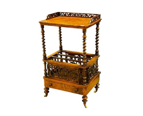 A Victorian walnut Canterbury, with galleried shelf above three divisions with base drawer,88 x 51 x 40cm