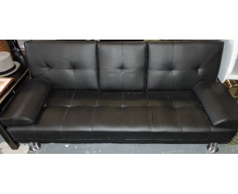 A contemporary black faux leather folding sofa bed with hinged central cup holder section 