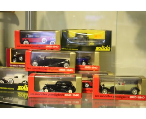 Eleven boxed Solido die-cast models of vintage vehicles