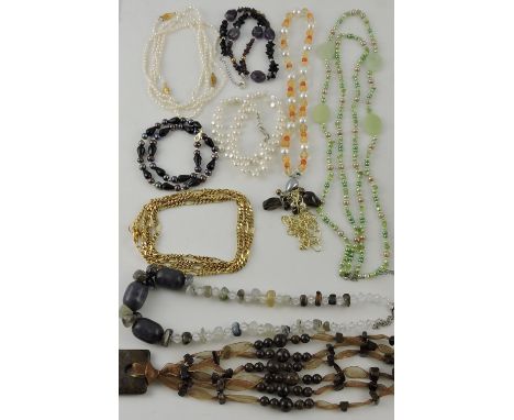 10 various freshwater pearl, hardstone and gilt necklaces.