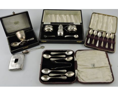 A silver christening egg-cup and spoon, Birmingham 1959, with case, together with a cased cruet set, two boxed sets of tea sp