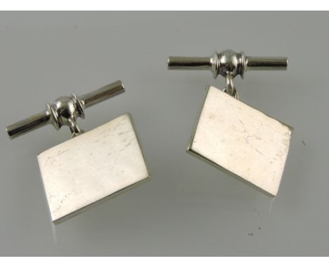 A pair of white metal cufflinks, of plain rectangular form on chain link bars.