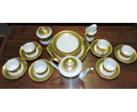 A Limoges coffee service for six place settings including a coffee pot, cream jug and sucrier, with a sage green band decorat