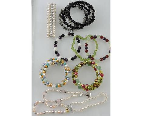 A collection of 10 various freshwater pearl and hardstone bracelets.