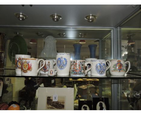 A Burleigh ware Dame Laura Knight George VI Coronation cup together with a collection of 18 further coronation cups, mainly G