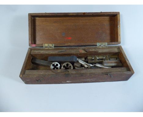 A Wooden Box Containing Engineering Tools 