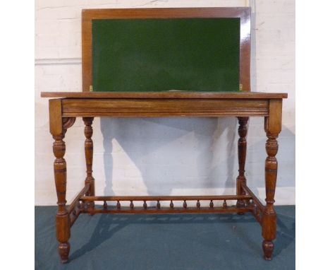 A Late Victorian Lift and Twist Walnut Framed Games Table on Turned Supports with Beize Playing Surface, 81 cm Wide 