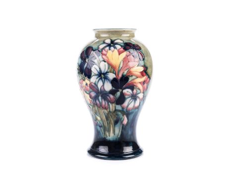 of baluster form with spring flowers on a shaded green and blue ground, signed, impressed factory mark, light crazing 24cm hi