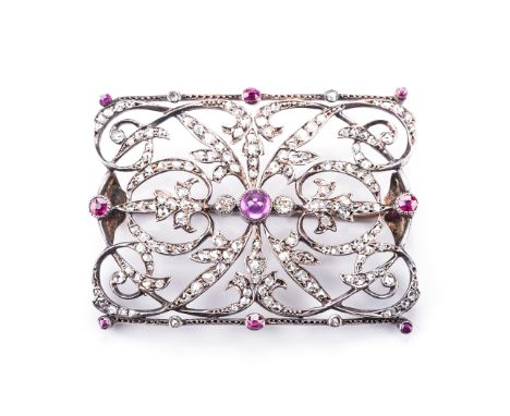  the rectangular shoe buckle centered with a ruby, scroll work and filigree, interspersed with old mine-cut diamonds, convert