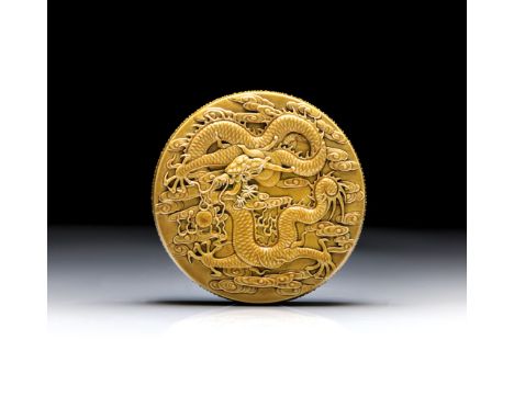 the circular cover masterfully carved with a five-clawed dragon in mid-flight pursuing a flaming pearl, the eyes picked in bl