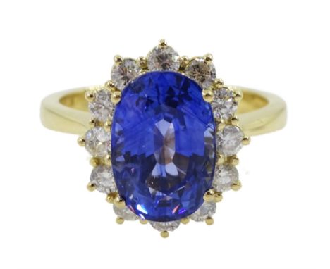 18ct gold fine Ceylon sapphire and diamond cluster ring, hallmarked, sapphire approx 3.85 carat, total diamond weight approx 