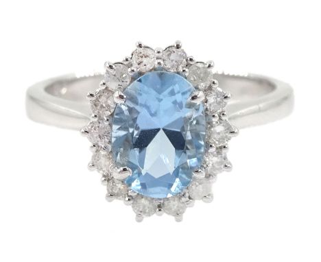 18ct white gold oval aquamarine and diamond cluster ring, hallmarked, aquamarine approx 1.00 carat, total diamond weight appr