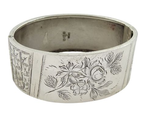 Silver hinged bangle with bright cut foliate decoration by Kenart Ltd, Birmingham 1934