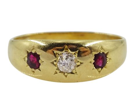 Early 20th century 18ct gold three stone garnet/ruby and diamond gypsy set ring