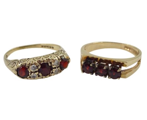 Gold three stone garnet ring and a gold garnet and cubic zirconia ring, both hallmarked 9ct