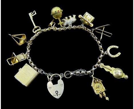 Gold bracelet with heart locket and twelve charms including cuckoo clock, bear, book and telephone, hallmarked or tested