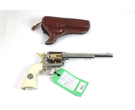A Umarex Co2 Cole "Peacemaker" .177 Cal. air pistol Ser. No. 17M01698 This example is the "Nickel and Gold" model with long b