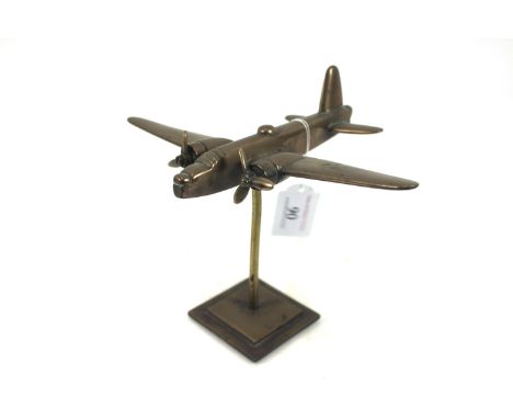 A model Wellington Mk3 in cast brass mounted onto brass base, another good period example 