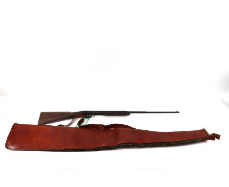 A "Tell" pre WWII .177 Cal. air rifle with a vintage leather slip