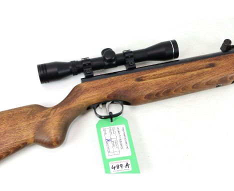 A Weihrauch H.W.35 .22 Cal. air rifle with a 4x32 telescopic sight (stock refinished) NB As a post 1939 air weapon the restri