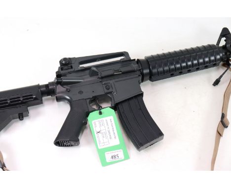 A "Colt" M4A1 Carbine in 6mm BB Cal. NB. As a post 1939 air weapon the restrictions of the Crime Reduction Act apply to the s