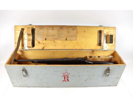 A Norwegian Kongsberg model 52 line throwing gun, based upon a Mauser action within it's original transit crate (de-activated