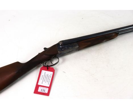 A Laurona 12 bore B.L.E. shotgun Ser. No. 28588, 70mm chambers, 28" barrels bored improved and half choked, in a canvas and l