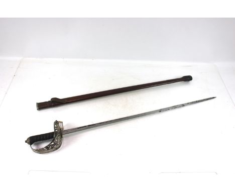 A Victorian 1895 model Infantry Officers sword with leather field scabbard. Victorian cyphers to hilt and clean blade 