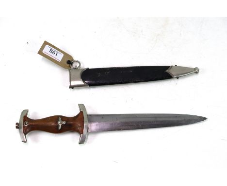 A Third Reich era N.S.K.K. dress dagger with scabbard. Blade maker marked Gebr. Bell Solingen .GR. (NB old repairs to grip an