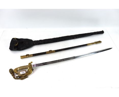 A GRV / GRVI Royal Naval Reserve officers sword with brass mounted scabbard, knot and original bag, A very nice example 