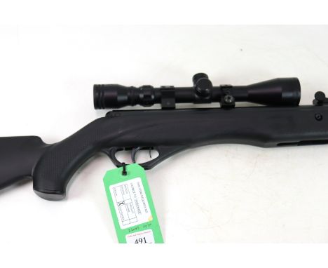 A Crosman Phantom .177 Cal. break barrel air rifle, in overall excellent condition with a 3-9 x 40 scope. NB. As a post 1939 
