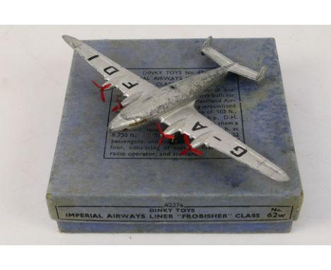 Dinky Toys - A boxed pre-war Dinky Toys #62w Imperial Airways Liner 'Frobisher' Class. The diecast in silver, features four 3