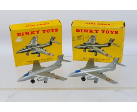 French Dinky - Two boxed French Dinky Toys 60b Vautour SNCASO. Both models in metallic grey with blue cockpits, have some sig