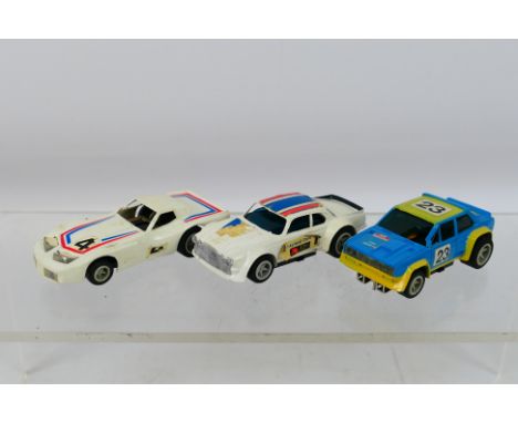 Matchbox - An unboxed trio of three Matchbox Powertrack 1:64 scale slot cars, comprising of Fiat Abarth; Corvette Stingray an