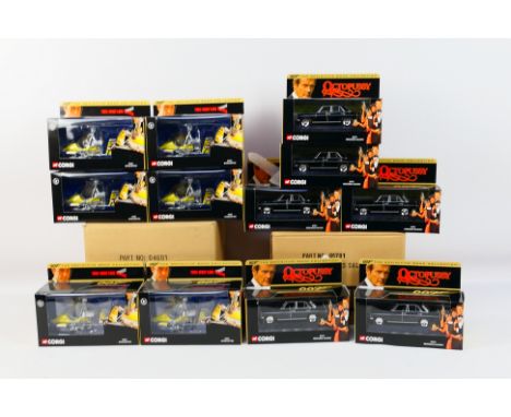 Corgi - Two, ex-shop stock, trade boxes containing a total of 12 Corgi diecast models from the '007 The Definitive Collection