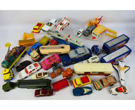 Corgi Toys - An unboxed group of playworn diecast model vehicles from Corgi. Lot includes Corgi Mazda B1600 Pickup ' The Incr