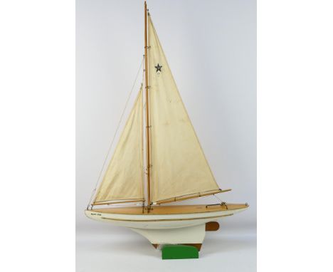 Star Yachts - A vintage wooden Super Bermuda series Star pond yacht named Baltic Star in white with gold trim # SB4. The mode