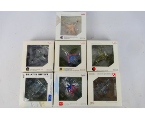Herpa - A squadron of seven boxed 1:200 scale diecast military aircraft from Herpa. Lot includes #551939 US Navy Boeing F/A-1