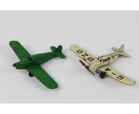 Dinky Toys - Two unboxed Dinky Toys model aircraft. Lot includes Dinky Toys 60K Light Tourer (Percival Gull) in green, no win