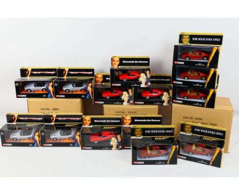 Corgi - Three,ex-shop stock, trade boxes containing a total of 14 Corgi '007 The Definitive Collection' diecast models. Lot c